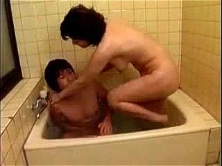 Asian mom sleeps with son