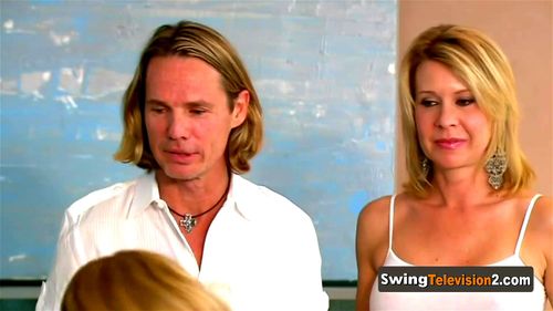 Swinger chick gets so horny when many swingers start playing with a toy on her pussy.: Porn