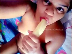 Teen Girl inserts a banana