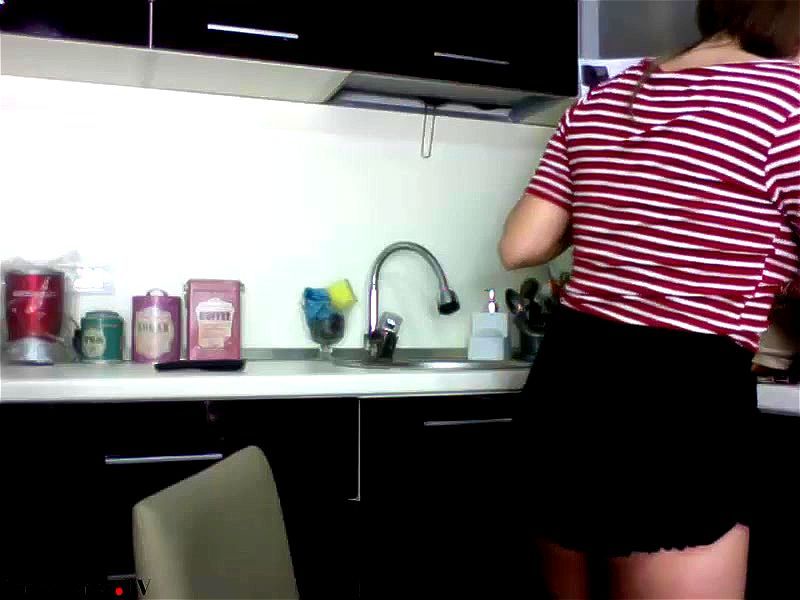 Brunette plays in her kitchen Brunette plays in her kitchen