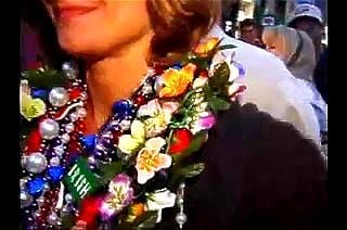 college instructor flashes at mardi gras
