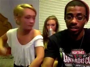 Black boy with two young white women thumbnail