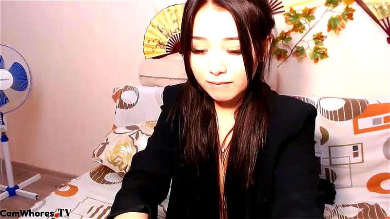 Asian plays with toy webcam Asian plays with toy webcam