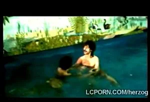 Horny couples explore their swinger side in the pool