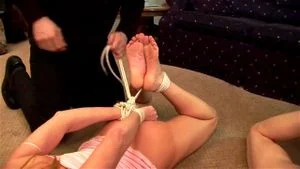 Women tied together thumbnail