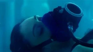 Woman with oxygen mask resus in a water tank