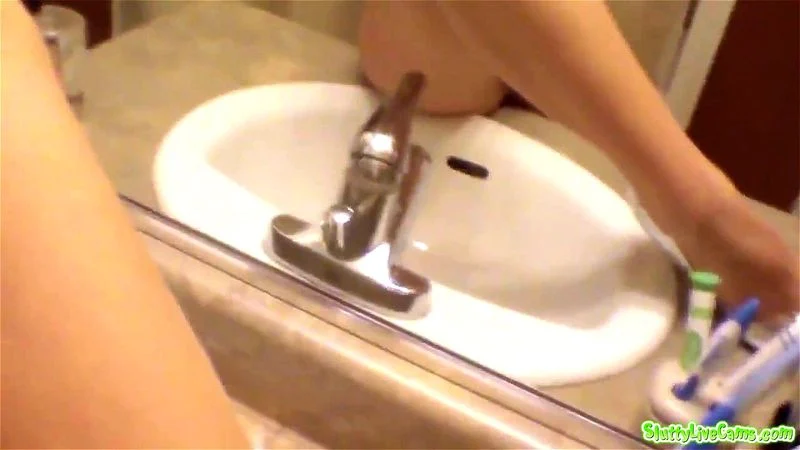 Bold brunette babe films her self in the bathroom touching her private parts Bold brunette babe films her self in the bathroom touching her private parts