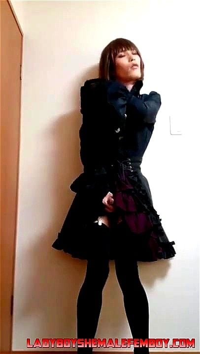 Japanese shemale in Goth dress playing