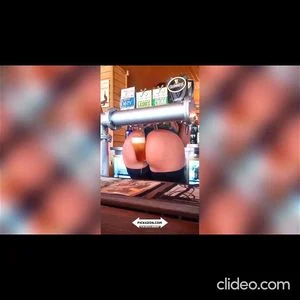 Bartender Maria Pours beer with booty