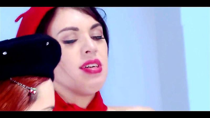 Brunette and redhead in fetish threesome Brunette and redhead in fetish threesome