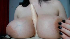 Dildo Titjob thumbnail