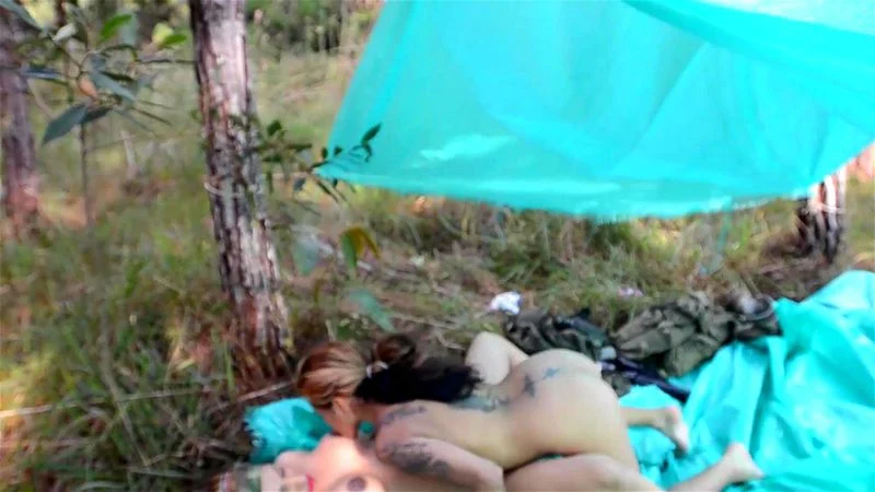 Latina pussy-eating outdoors in Jungle insurgent camp