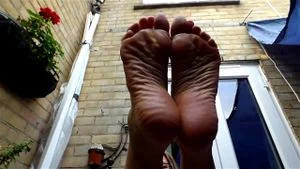 MILF shows off her mature wrinkled soles and feet