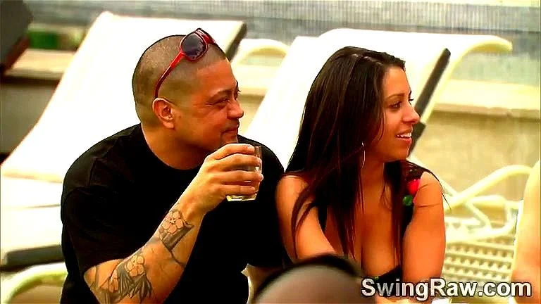 Swinger couples have a naughty pool party outdoors Swinger couples have a naughty pool party outdoors