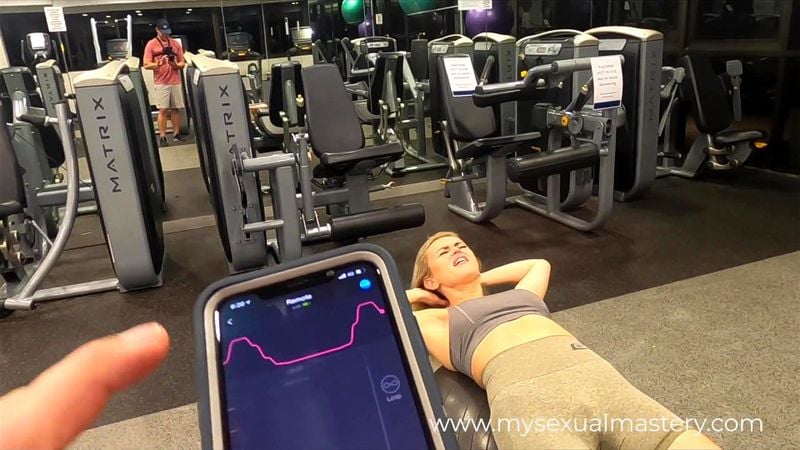 Sexy Girl Working out with Remote Control Sex Toy in Public Gym