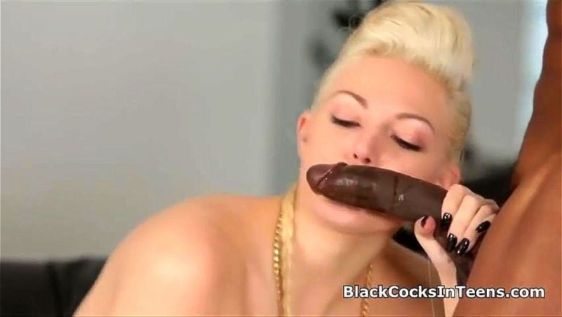 Busty blonde fucks big black cock at photoshoot