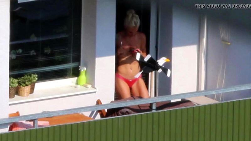 Very hot neighbour topless on balcony