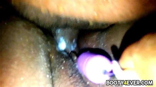 Clit stimulating ebony gets her pussy fucked and jizzed