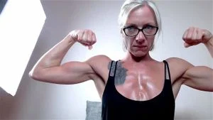 Muscular Mature Woman Flexing Muscles