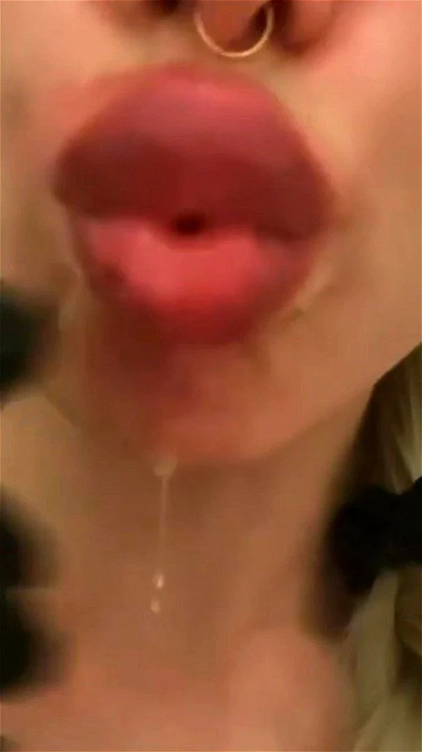 Glossy huge lips tease