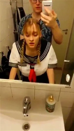 Blonde Schoolgirl in toilet