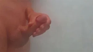 Playing in the shower (cumshot)