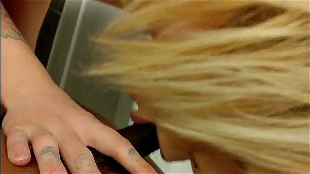 Blonde Tgirl sucking cock in someones restroom