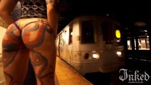 tatted hoe twerking infront of the city. Thong up her fat tatted booty