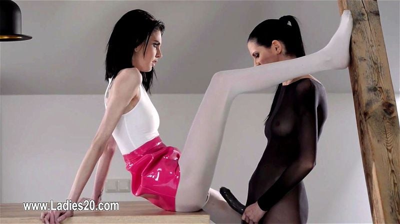 sleek babes in pants enjoying strap